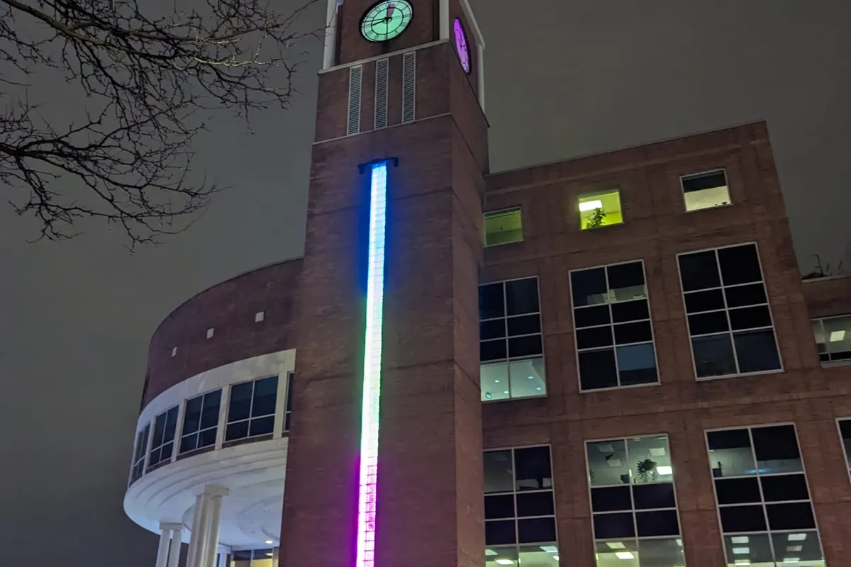 Brampton Clock Tower illuminated in blue and pink for Rare Disease Day