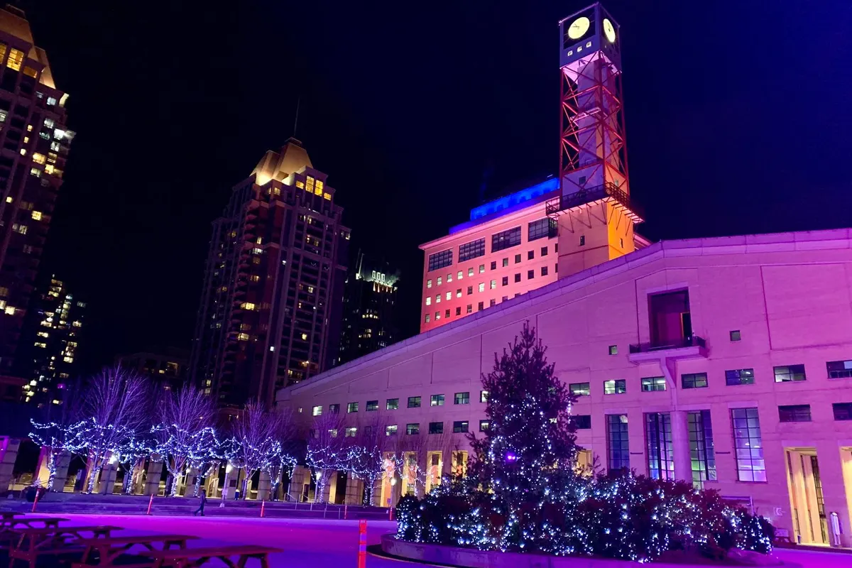 Mississauga Civic Centre illuminated in purple and blue for Rare Disease Day