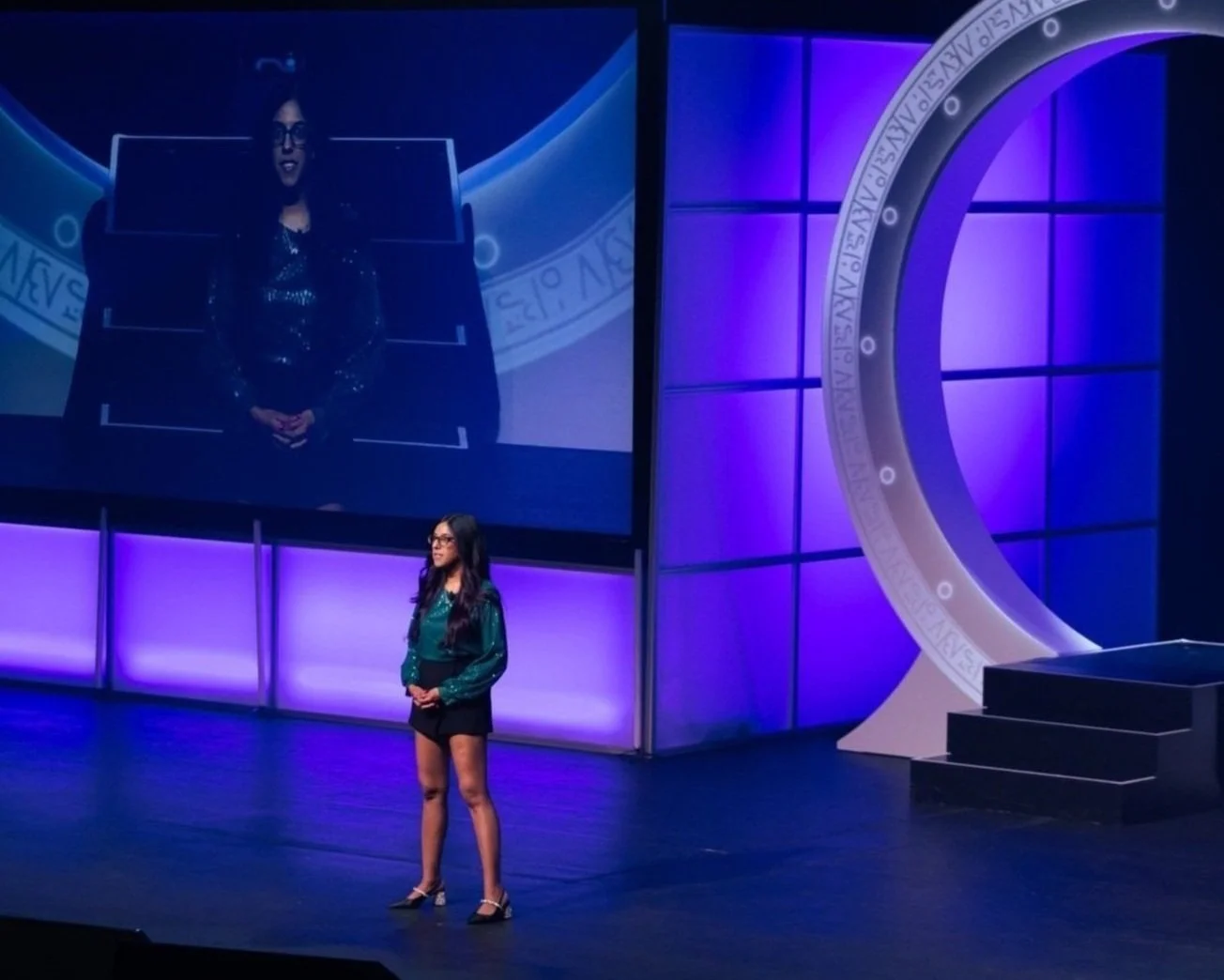 Lauren Pires delivering keynote at Archangel Summit