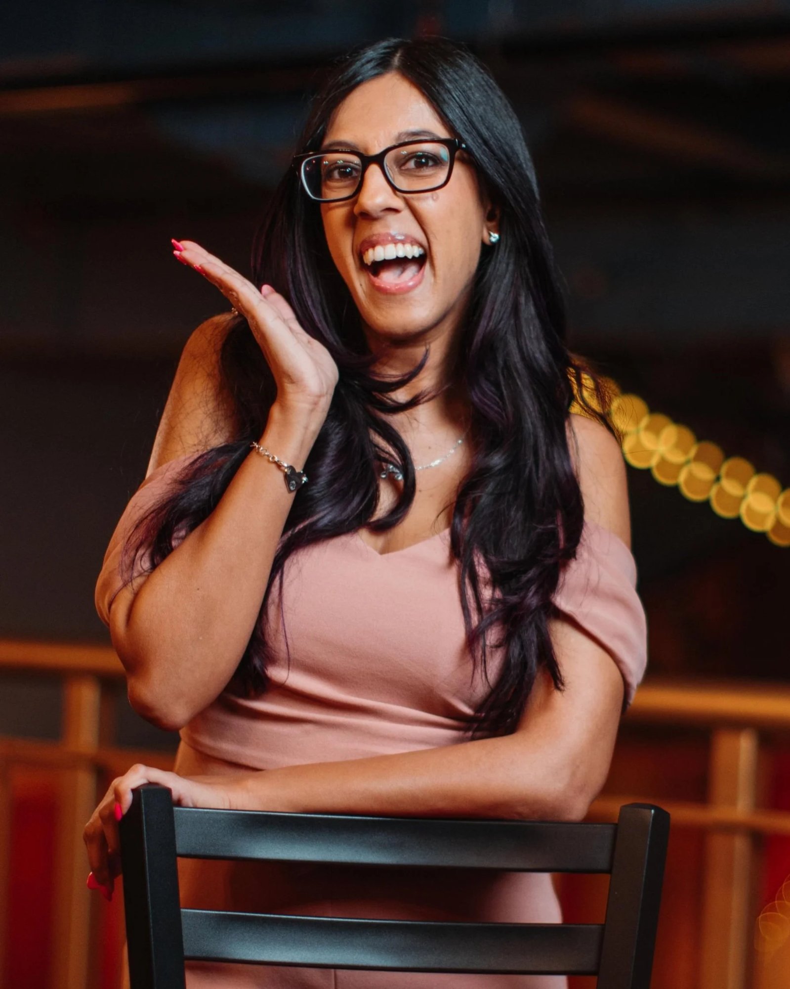 Lauren Pires laughing, invisible disability keynote speaker