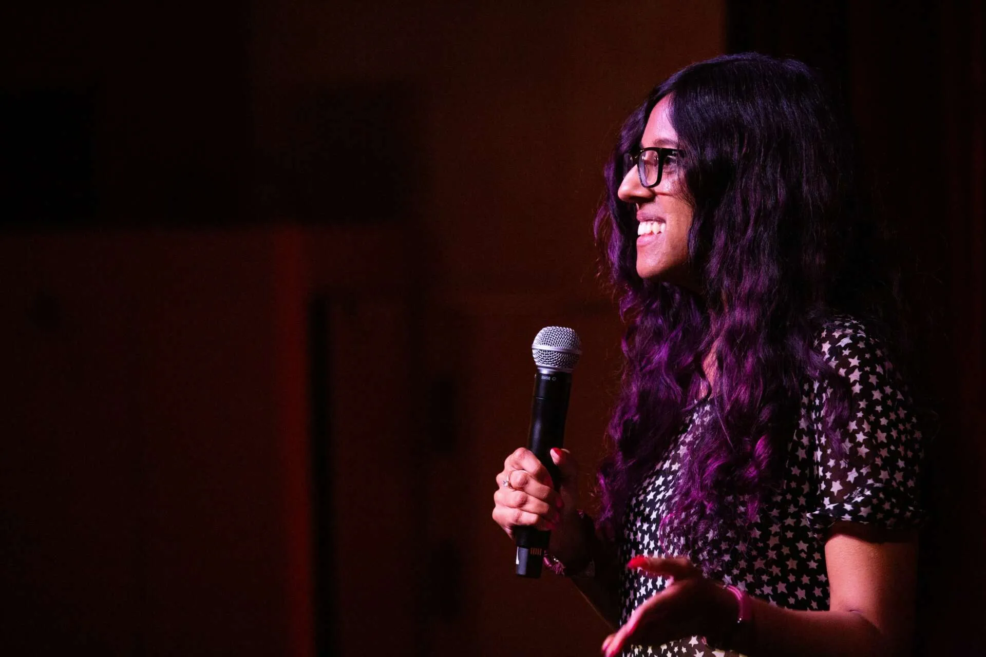 Lauren Pires delivering invisible disability keynote at Speaker Slam